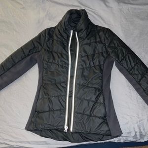 Dark Grey CALIA winter jacket. flexible material side. Great for jogs!